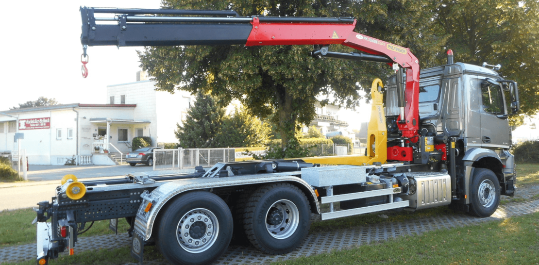 PALFINGER Abrollkipper mit Ladekran PALFINGER Abrollkipper mit Ladekran